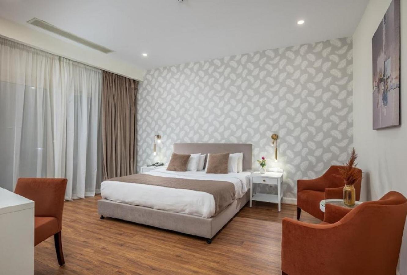 Tolip Family Park Hotel Cairo Exterior foto A bedroom at the hotel