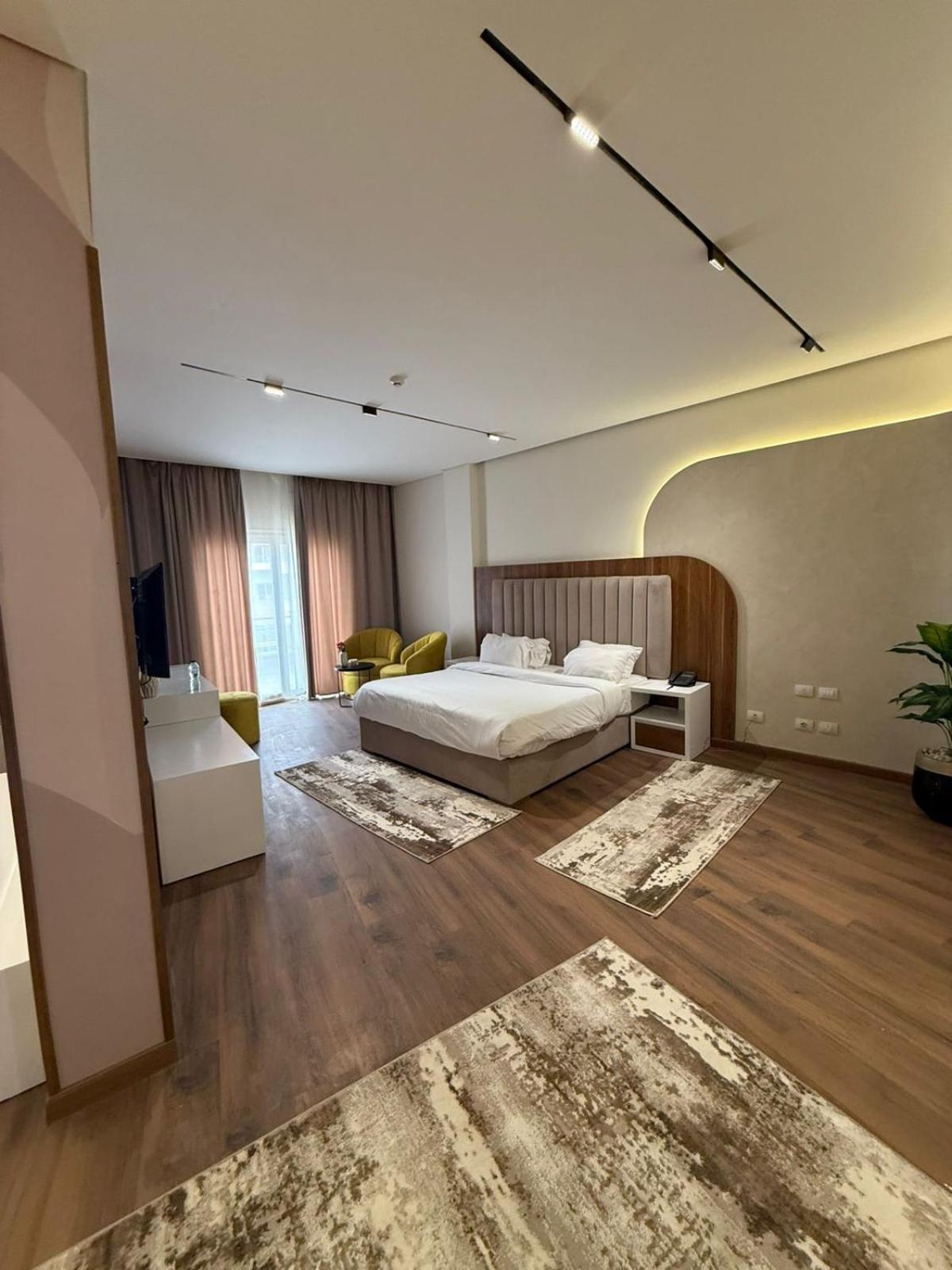 Tolip Family Park Hotel Cairo Exterior foto A bedroom at the hotel