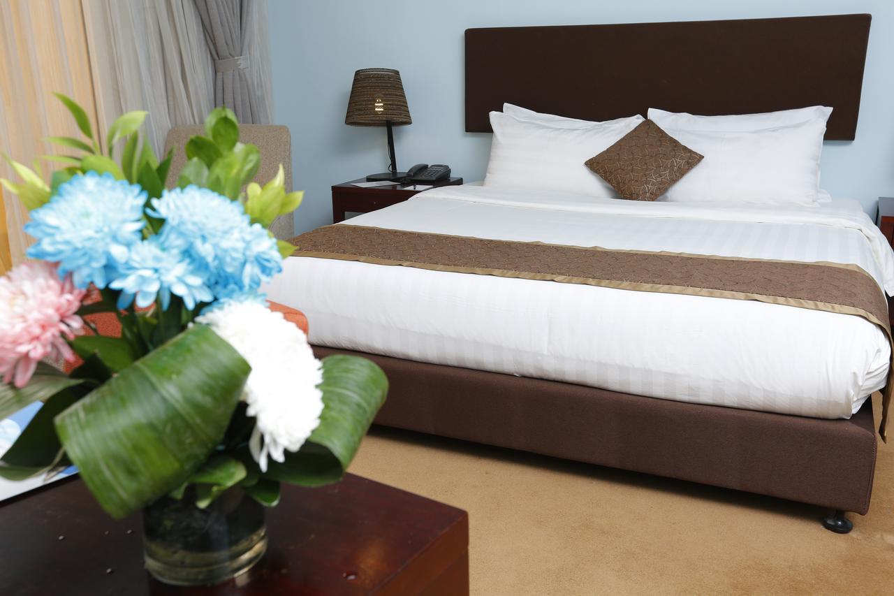 Tolip Family Park Hotel Cairo Exterior foto A bedroom at the hotel
