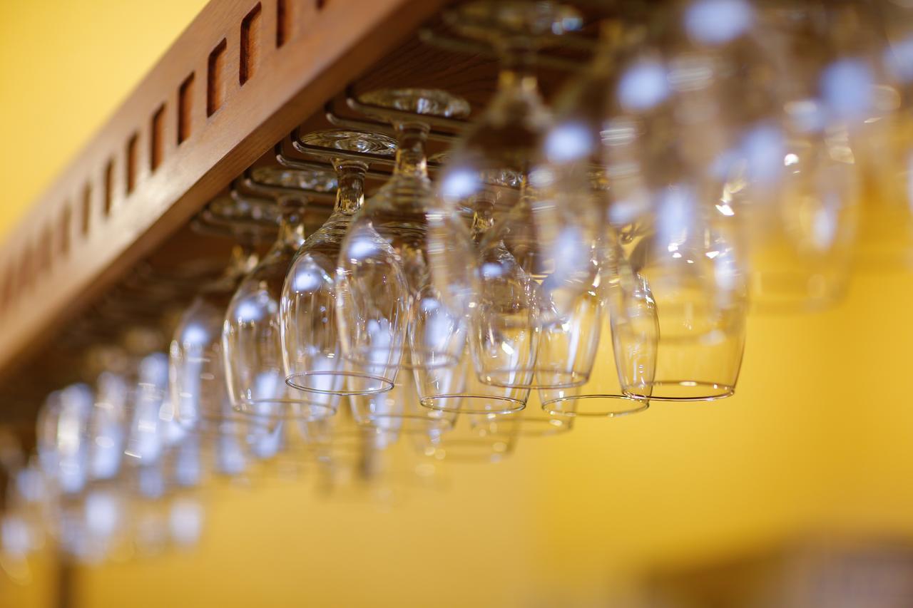 Tolip Family Park Hotel Cairo Exterior foto Wine glasses hanging from a rack